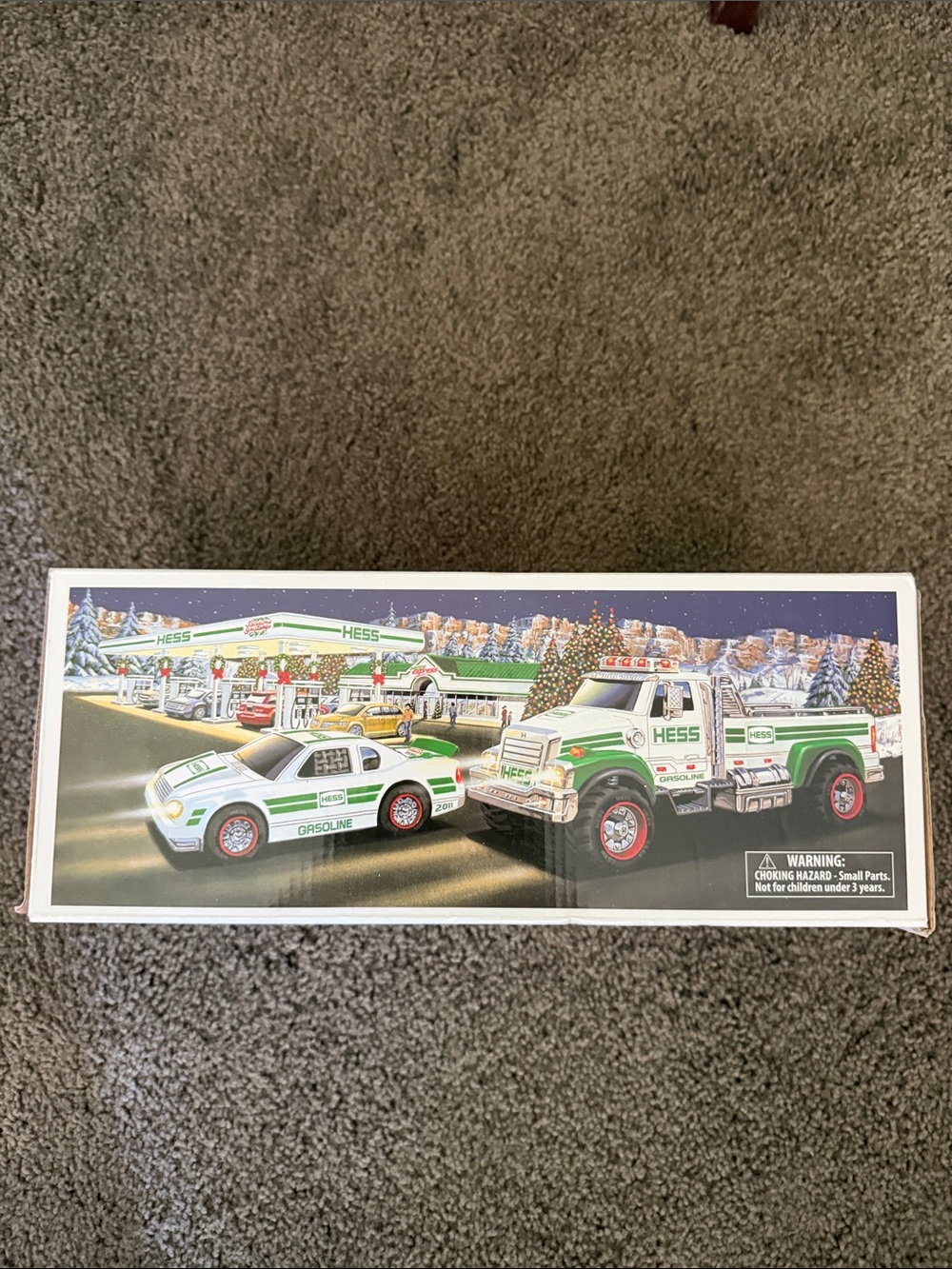New Hess 2011 collecibleToy Holiday Truck and Race Car Set in White and Green.